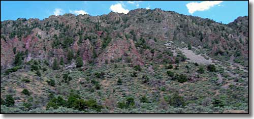 granite palisades rising just south of Pilar