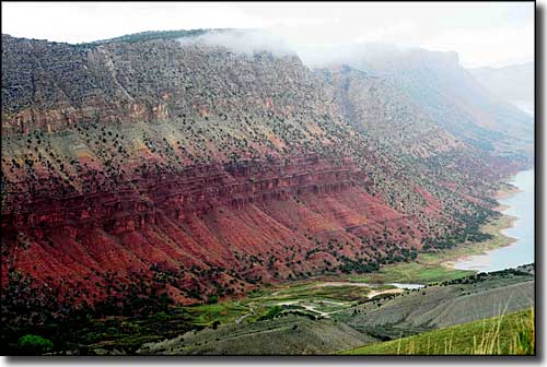 The Navajo Cliffs Rise above Flaming Gorge Reservoir